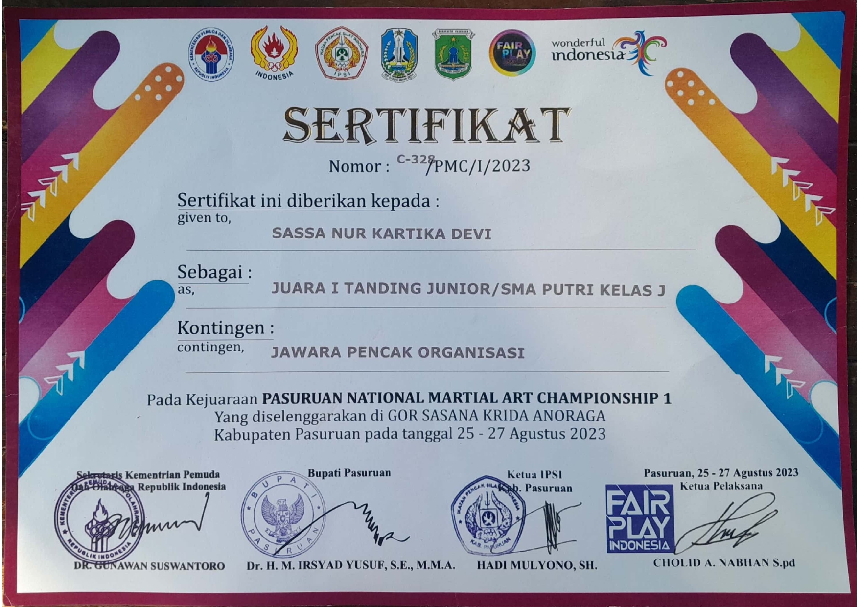 Juara 1 Tanding Junior/SMA Putri Kelas J pada Pasuruan National Martial Art Championship 1