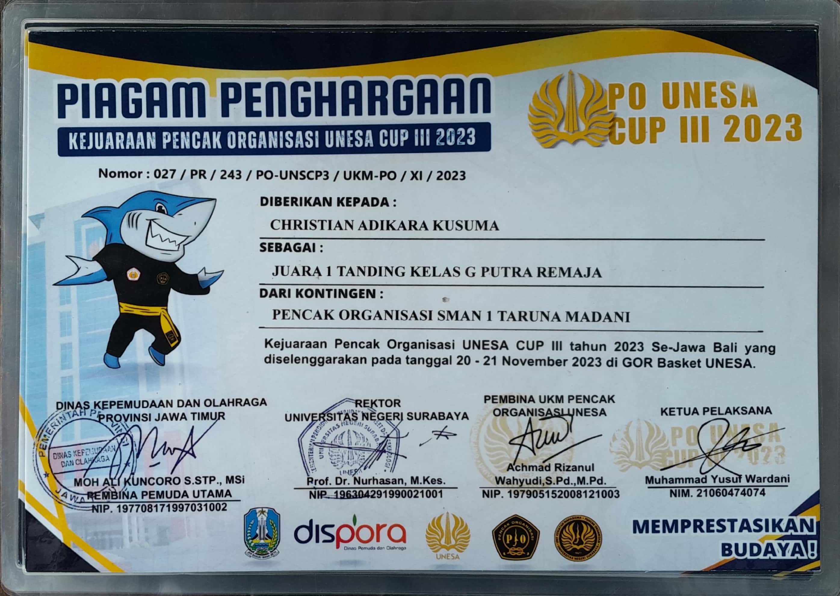 Juara 1 Tanding Kelas G Putra Remaja dalam Kejuaraan Pencak Organisasi UNESA Cup III tahun 2023 Se-Jawa Bali