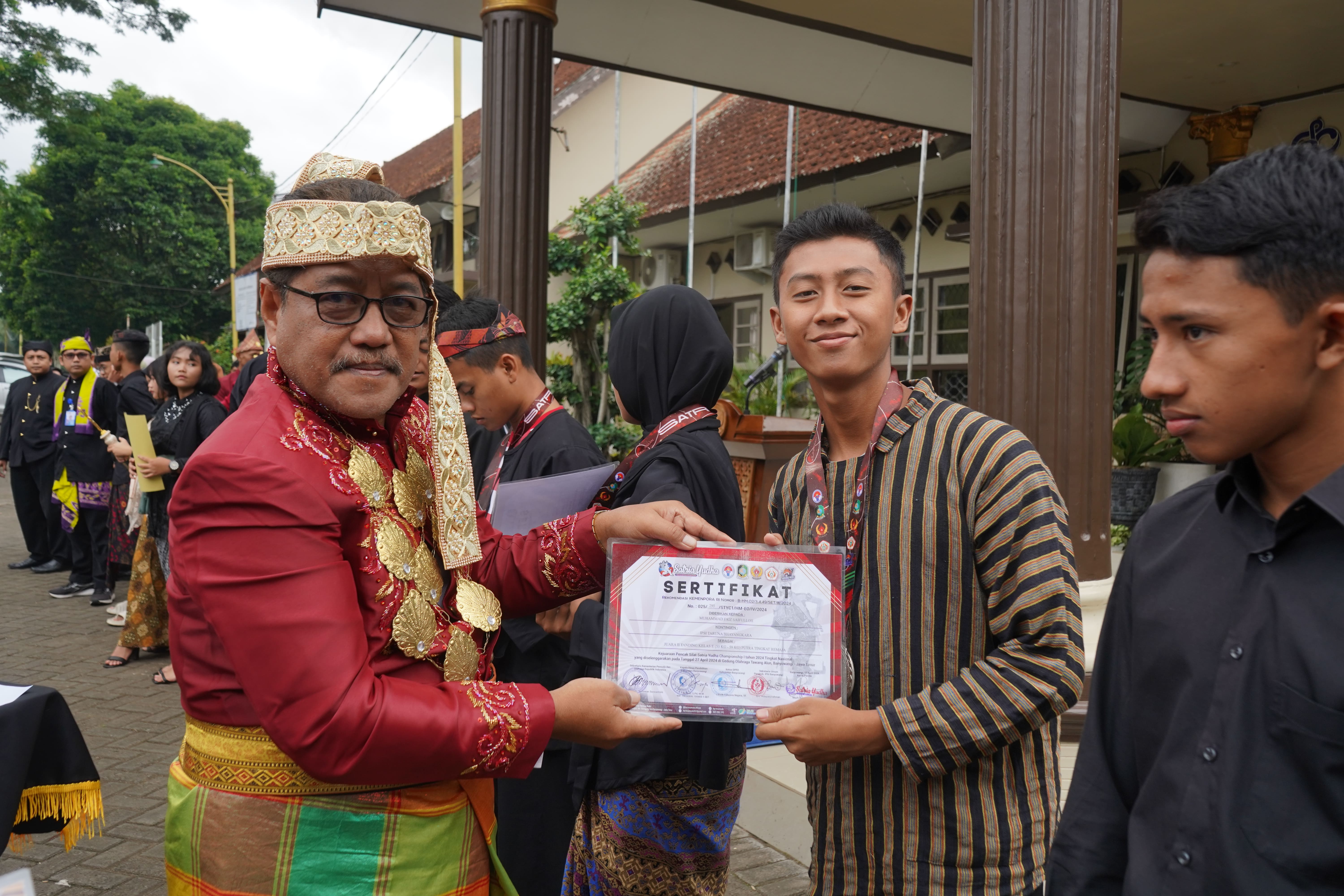 JUARA 2 TANDING KELAS E (55 KG - 59 KG) PUTRA TINGKAT REMAJA PADA KEJUARAAN PENCAK SILAT SATRIA YUDHA CHAMPIONSHIP 1