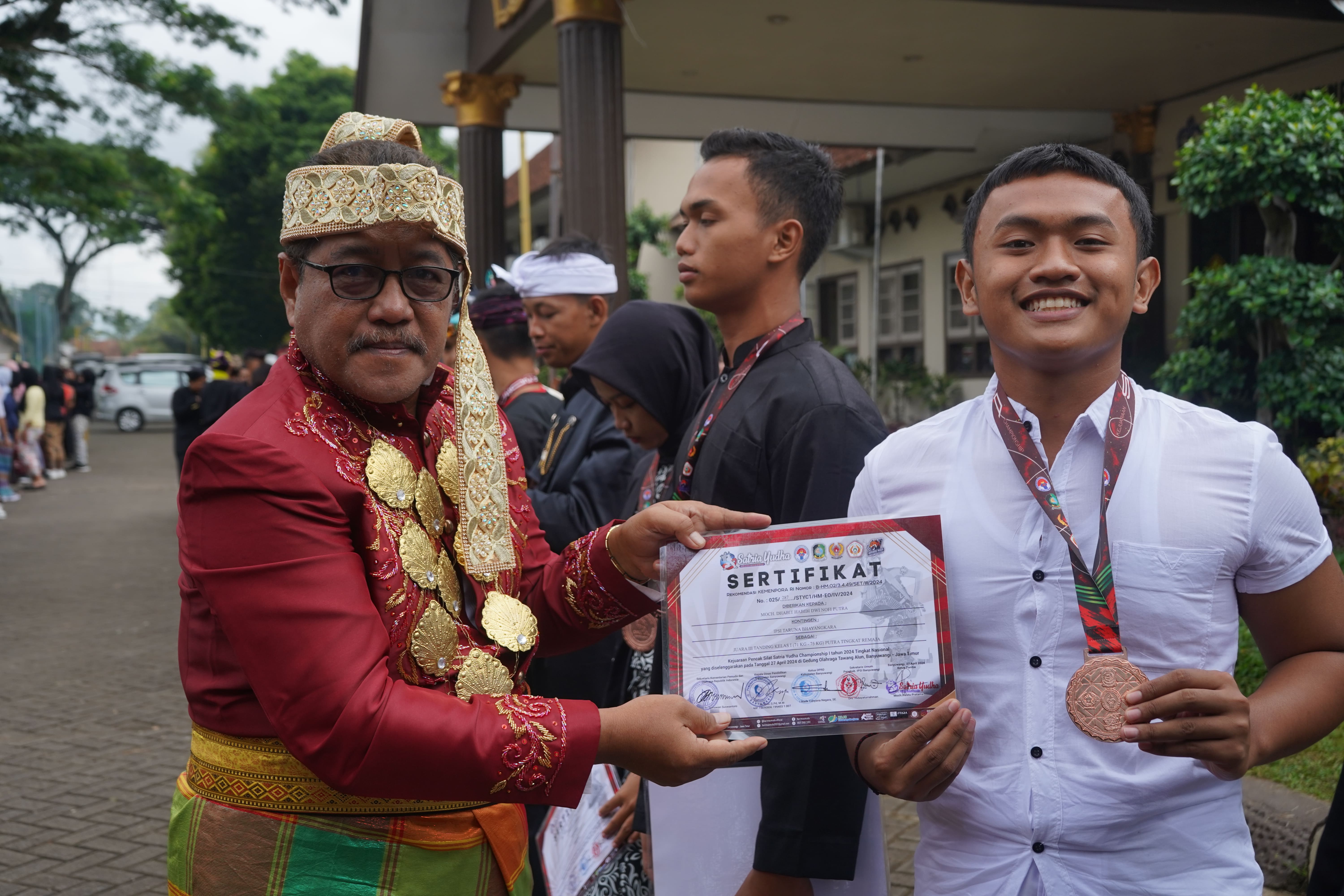 JUARA 3 TANDING KELAS I (71 KG - 75 KG) PUTRA TINGKAT REMAJA PADA KEJUARAAN PENCAK SILAT SATRIA YUDHA CHAMPIONSHIP 1