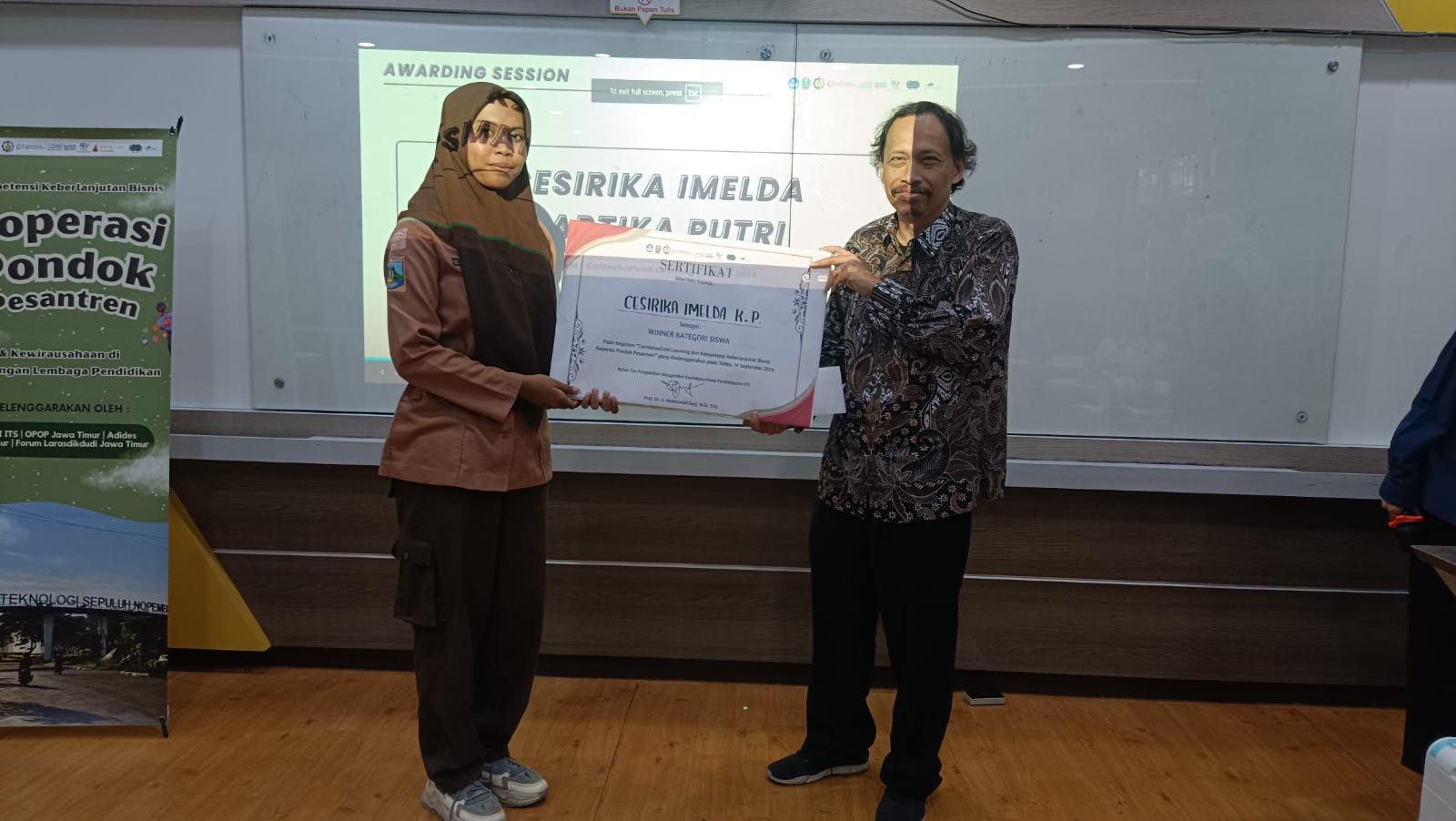 Juara 1  Contectualized Learning dan Kompetensi Keberlanjutan Bisnis Koperasi  Pondok Pesantren 