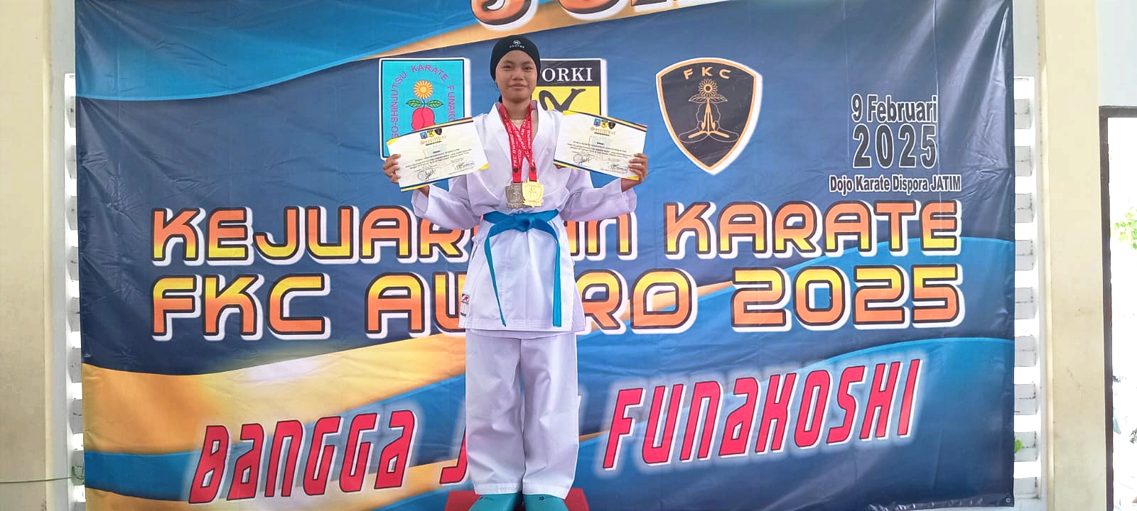 Juara 1 Seni Perorangan Junior Putri dan Juara 2 Kumite Perorangan -59 KG Junior Putri pada KEJUARAAN KARATE FKC AWARD 2025 yang diselenggarakan di Dojo Karate Dispora Jawa Timur